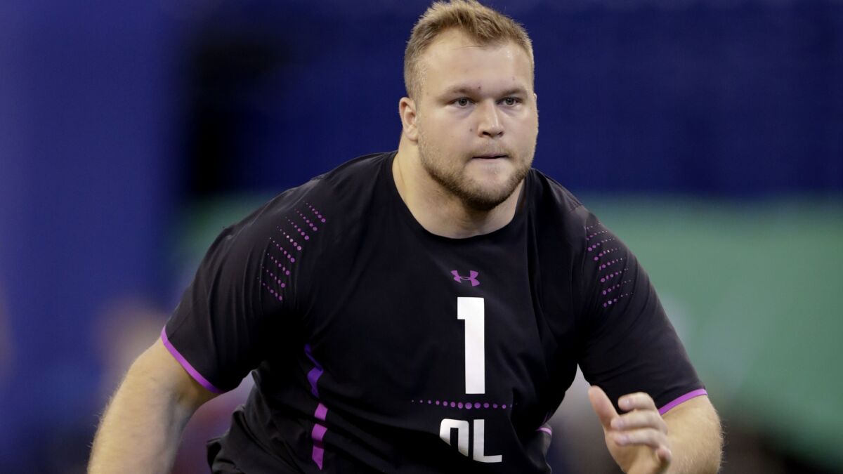 Michigan State offensive lineman Brian Allen runs a drill at the NFL draft combine.