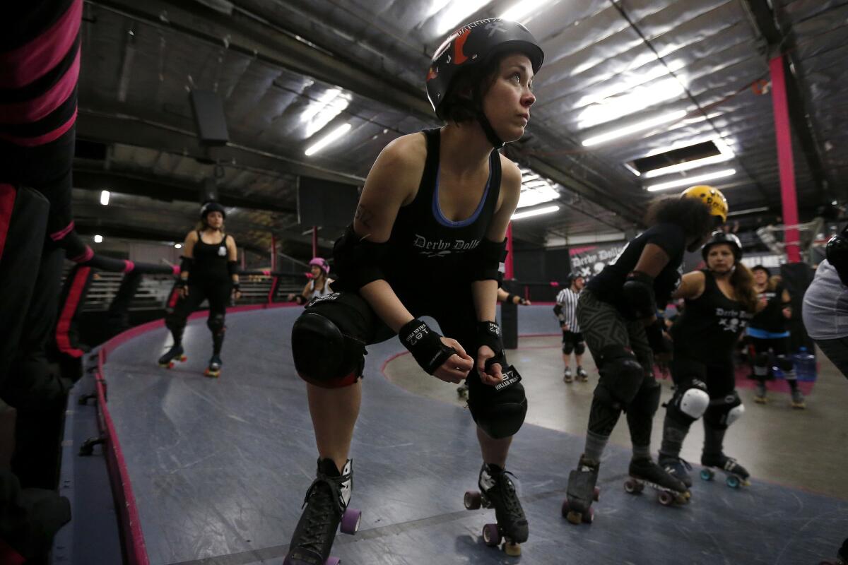Christina Hood ("Prances McDormand") of the L.A. Derby Dolls, an all-female roller derby league, scrimmages against Beach Cities in Los Angeles on Jan. 4.