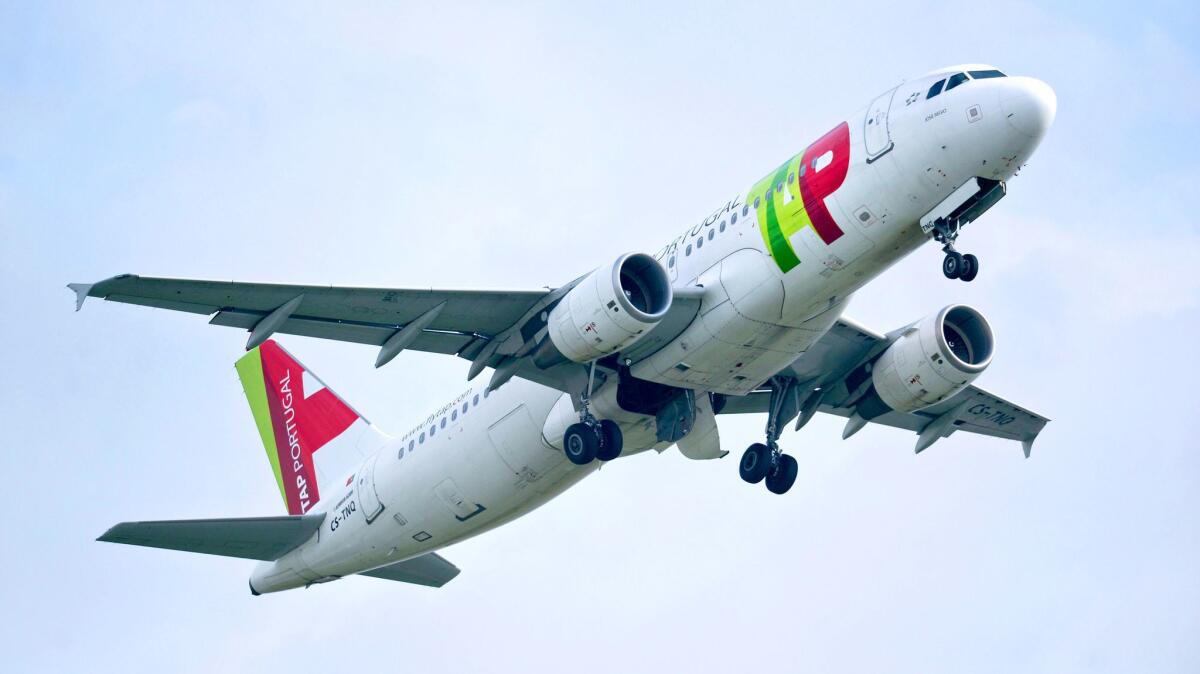 A Tap airline plane takes-off from Lisbon's Airport on February 6, 2016.