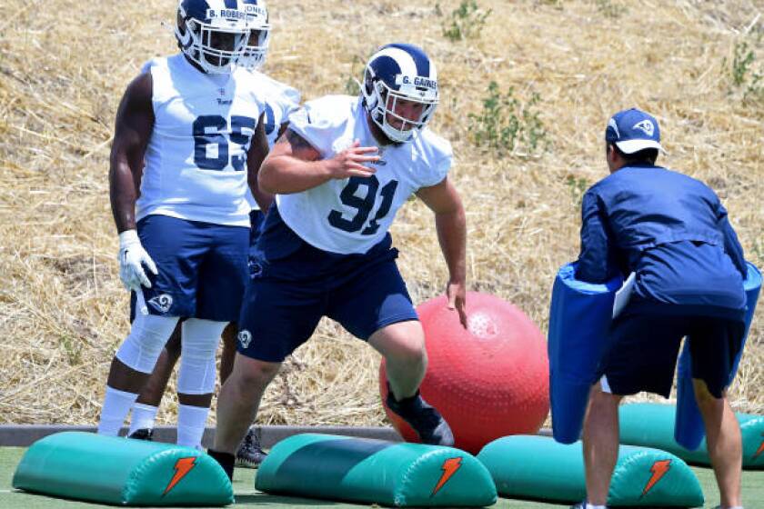 THOUSAND OAKS, CA - JUNE 11: Defensive tackle Greg Gaines #91 of the Los Angeles Rams runs drills during minicamp at the team's practice facility at California Lutheran University on June 11, 2019 in Thousand Oaks, California. (Photo by Jayne Kamin-Oncea/Getty Images)