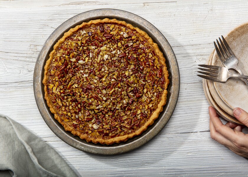 Thanksgiving pecan pie recipe enriched with sweetened condensed milk