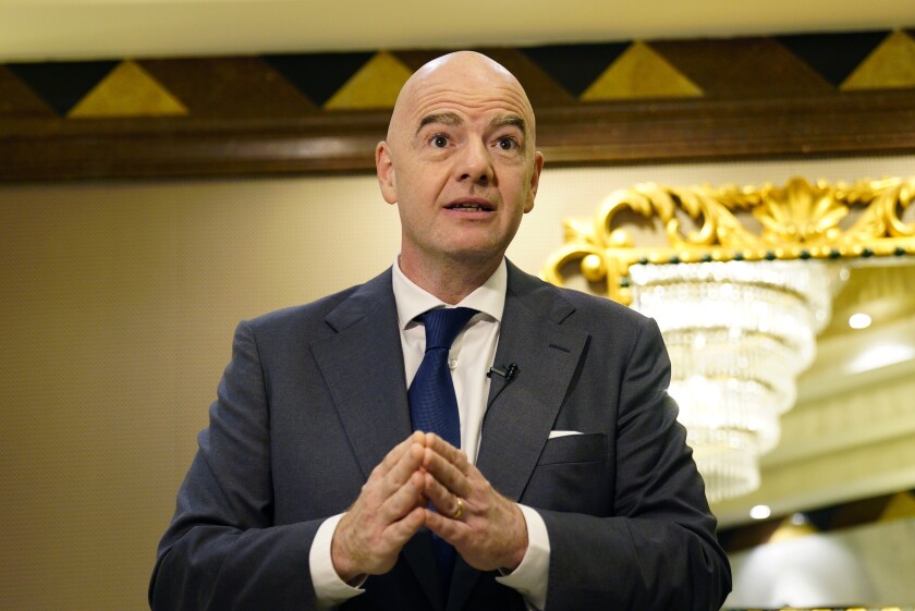 FILE - FIFA President Gianni Infantino speaks during an interview conducted with The Associated Press in Doha, Qatar, March 29, 2022. Infantino said migrant workers gain pride from hard work when he was questioned on Monday, May 2, 2022, about workers suffering in Qatar while building World Cup infrastructure. (AP Photo/Lujain Jo, File)