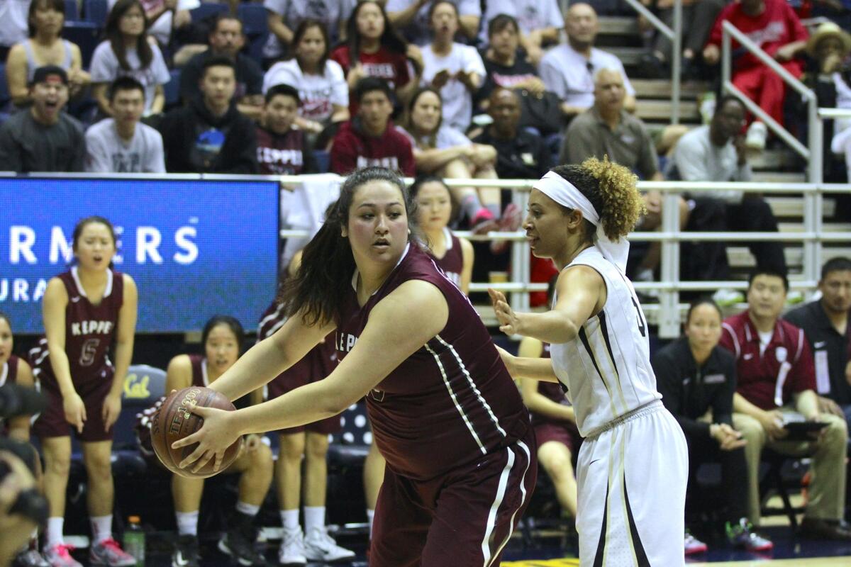 Keppel center Kylie Fujioka posts up against Mitty's Imani Dayvs in the CIF Division II state final at Haas Pavilion.