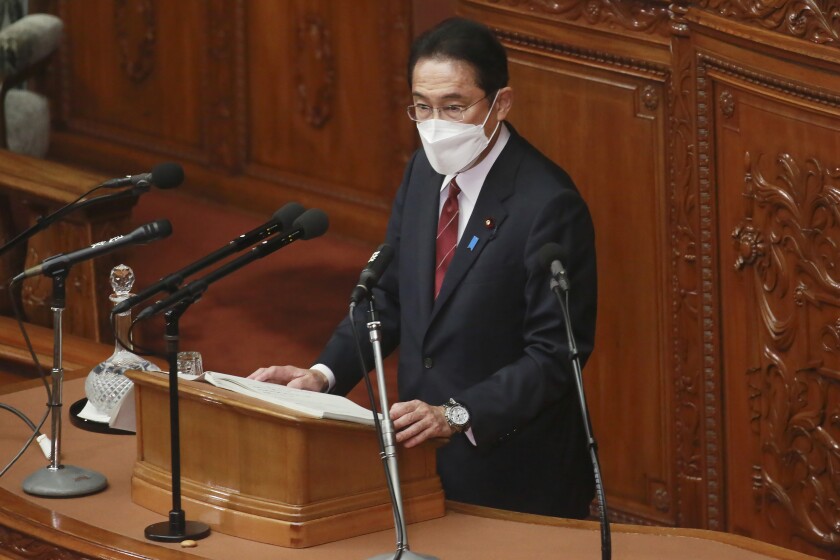 Japanese Prime Minister Fumio Kishida delivers his policy speech during an extraordinary Diet session at the lower house of parliament in Tokyo, Monday, Dec. 6, 2021. Japan confirmed on Monday its third case of a new variant of the coronavirus from an entrant from Italy, as the Prime Minister Fumio Kishida vowed to get prepared based on a worst-case scenario in dealing with a next resurgence. (AP Photo/Koji Sasahara)