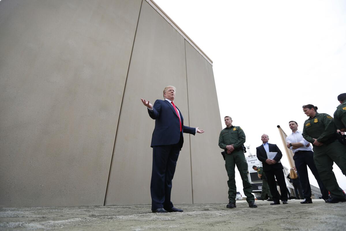 President Trump tours border wall prototypes near the Otay Mesa Port of Entry in San Diego County in 2018. 