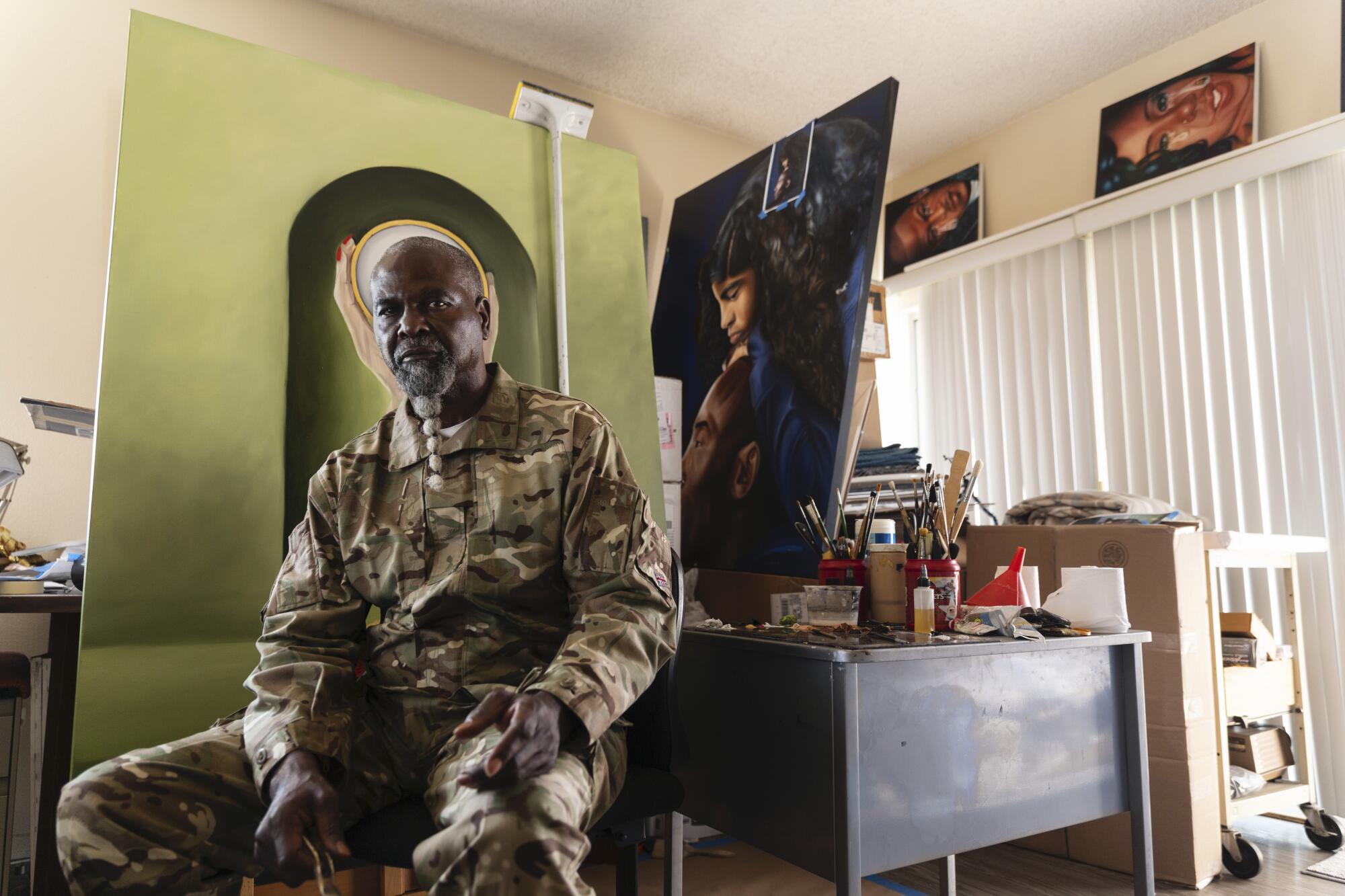 Artist, Fulton Leroy Washington also known as "Mr. Wash" photographed in his home in Compton, CA