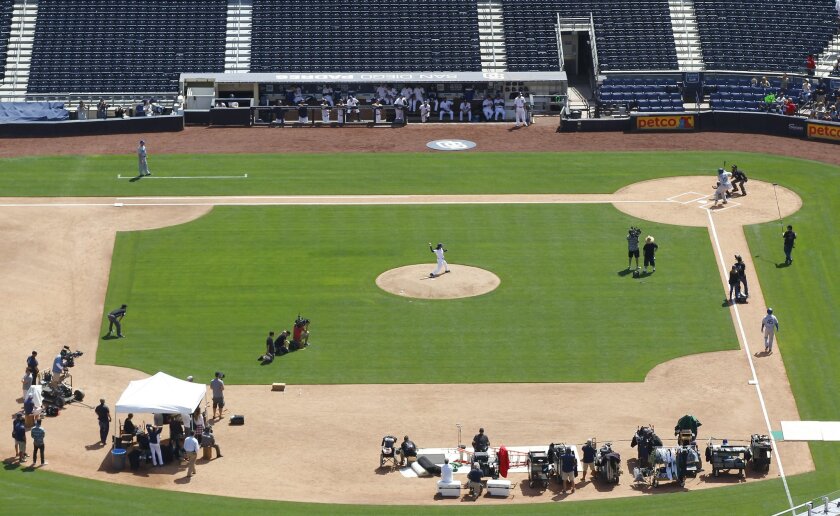 A television crew films the 20th Century Fox pilot Pitch at Petco Park. The show centers on a young female pitcher, played by Kylie Bunbury, who becomes the first woman to play in the major leagues