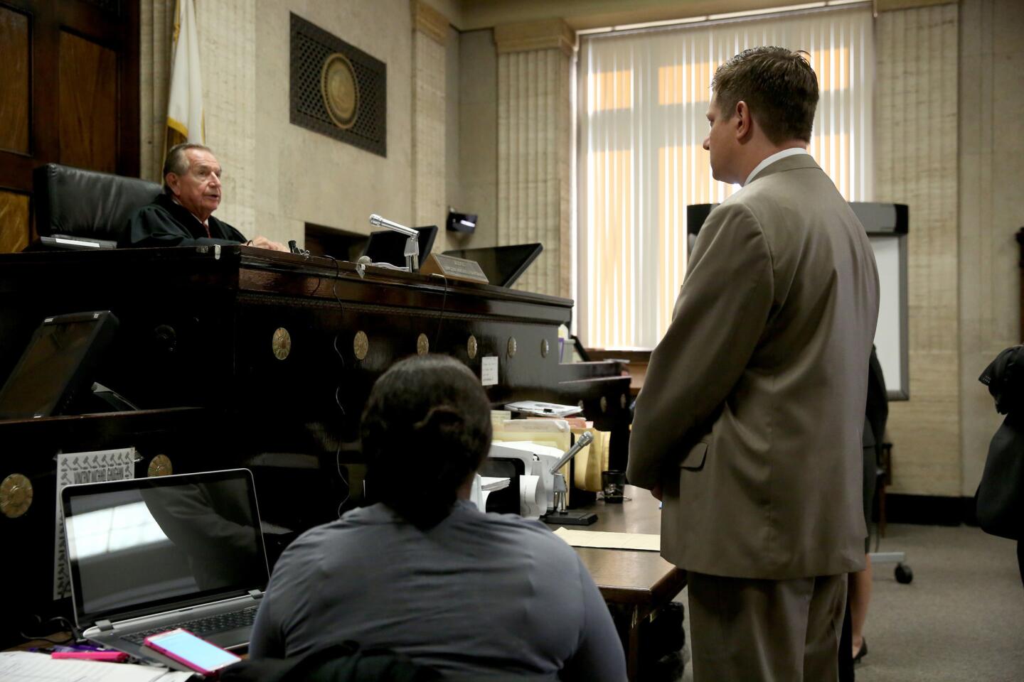 Chicago police Officer Jason Van Dyke appears before Cook County Circuit Judge Vincent Gaughan in 2016 during a hearing in his murder trial.