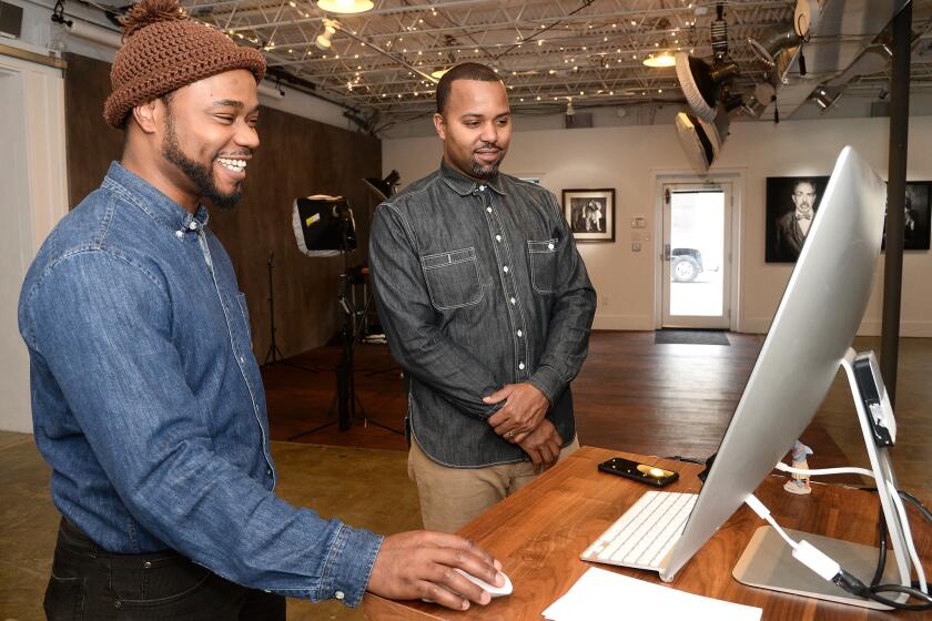 Maurice Taylor, left, and Eric Elston, right, founded the Annapolis based multimedia company ArtLife Studio, which recently completed an animation for Jay-Z about his daughter Blue Ivy.
