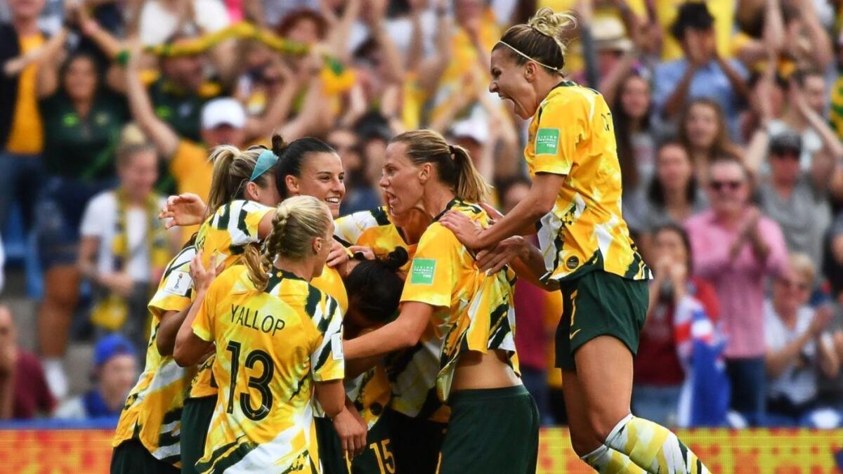 Australia celebrates after scoring a second goal against Brazil in the Women's World Cup on June 13.