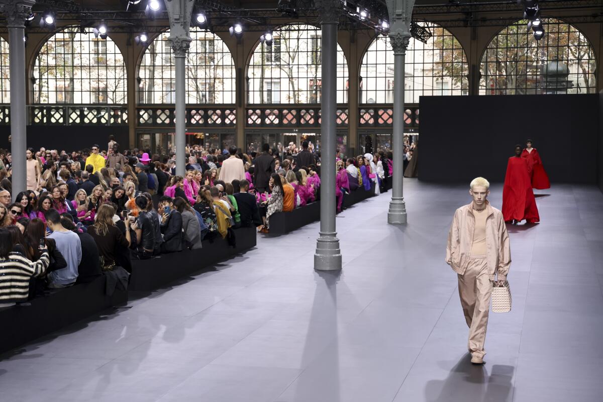 Glitzy Valentino show sees Paris Fashion Week at fever pitch - The San Diego  Union-Tribune