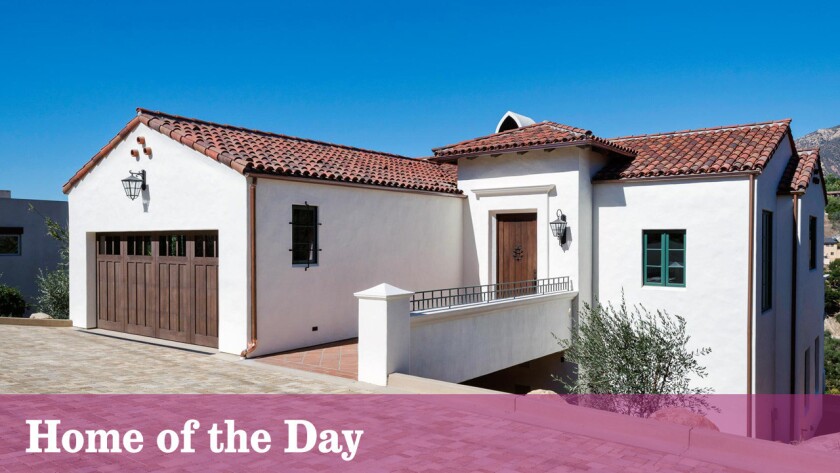 The 2,454-square-foot house has two master suites among its four bedrooms.