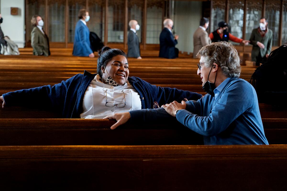 Da'Vine Joy Randolph has a moment with director Alexander Payne in a church setting while shooting "The Holdovers."