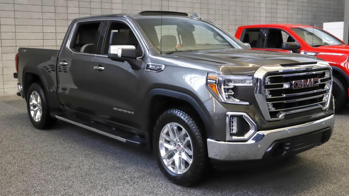 The price of GMC’s Sierra pickup can easily top $70,000, but the infotainment screen never gets much bigger than an iPhone.