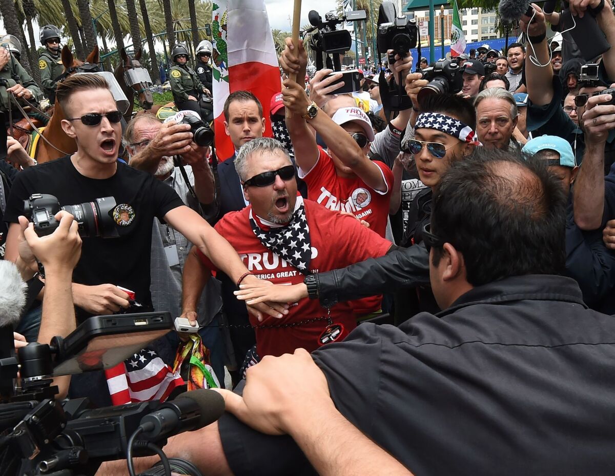 Anti-Trump protesters clash with Trump supporters outside the Anaheim Convention Center during a rally on May 25. (Mark Ralston / AFP / Getty Images)