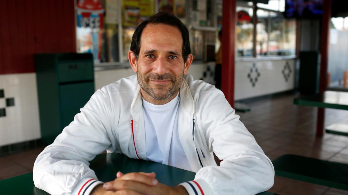 An April 2016 file photo of American Apparel founder Dov Charney in south Los Angeles where he hopes to open a manufacturing facility for his new apparel brand.