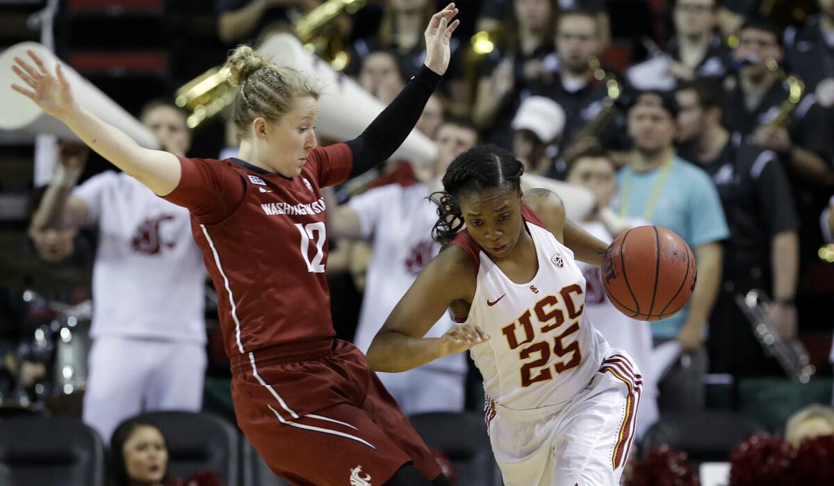 USC's Alexis Lloyd dribbles past Washington State's Taylor Edmondson during the Pac-12 women's basketball tournament in March. Lloyd and her teammates went 19-13 overall in 2015-16.