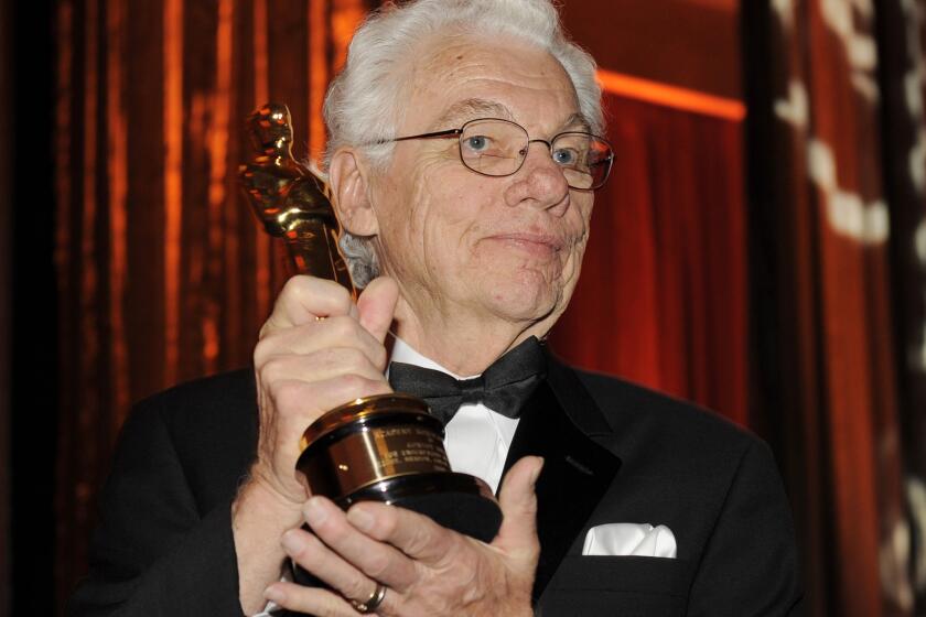 Cinematographer Gordon Willis poses with his honorary Oscar following The Academy of Motion Picture Arts and Sciences 2009 Governors Awards in Los Angeles.