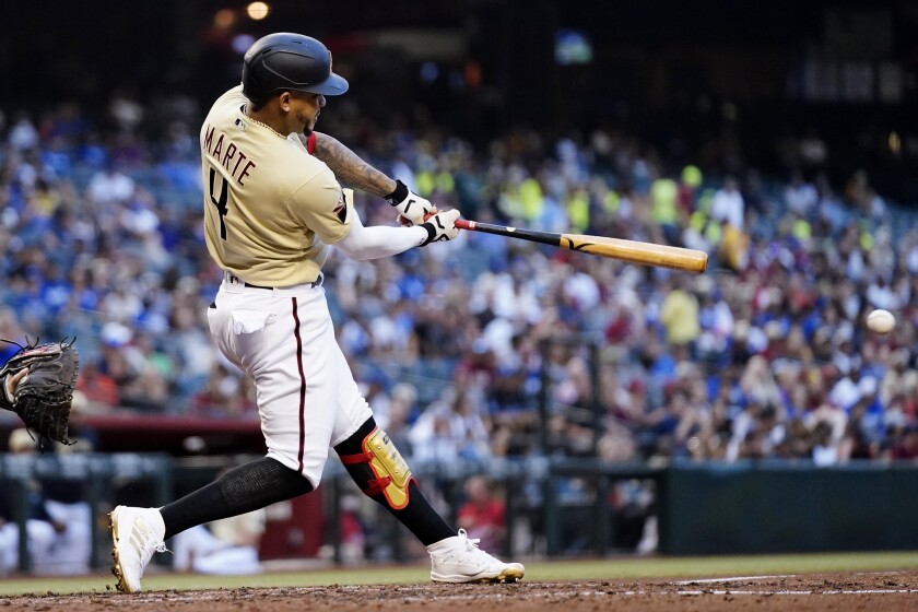 Arizona's Ketel Marte connects for a single in the third inning.