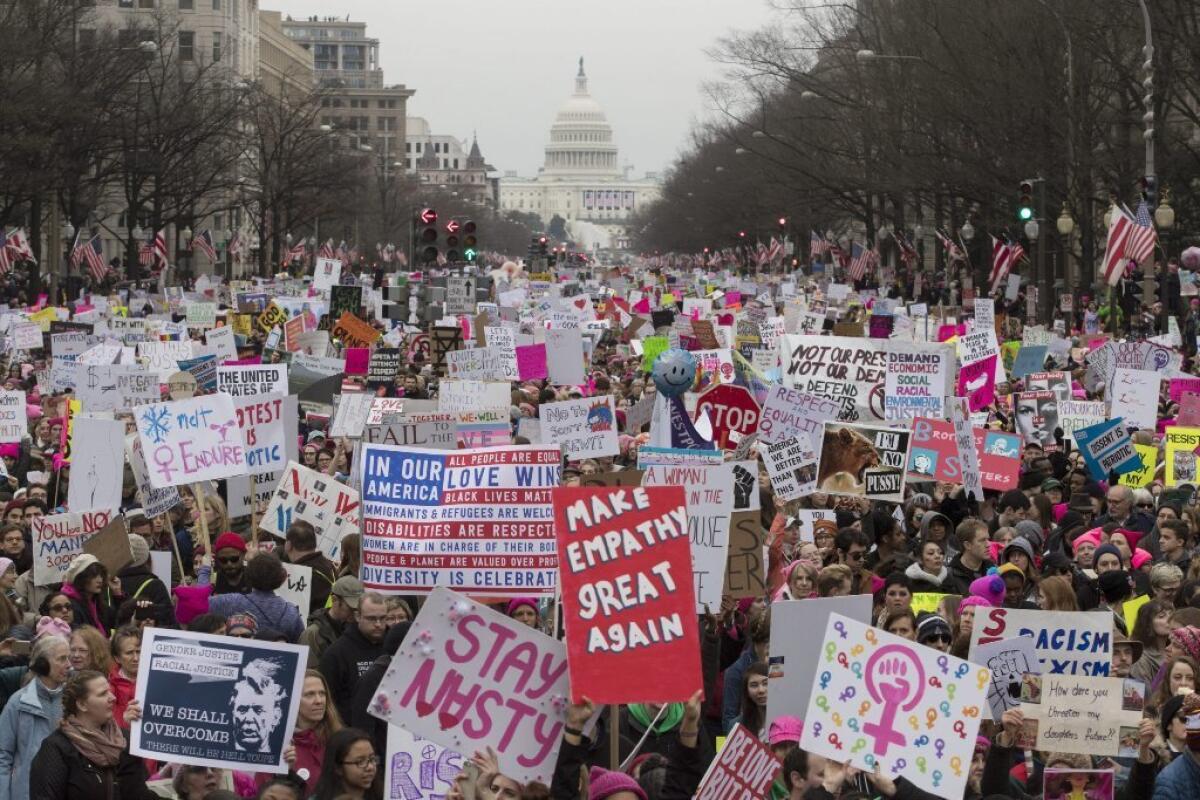 Thousands of people on Pennsylvania Avenue participate in the Women's March on Washington, a rally to protest President Donald J. Trump the day after he was sworn in as the 45th president of the United States.