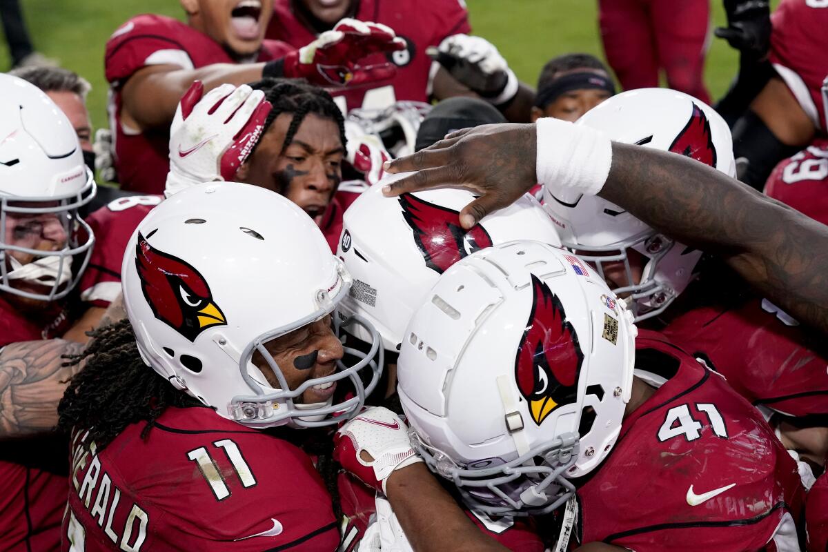 The Arizona Cardinals celebrate after their game winning touchdown against the Buffalo Bills during the second half of an NFL football game, Sunday, Nov. 15, 2020, in Glendale, Ariz. The Cardinals won 32-20. (AP Photo/Ross D. Franklin)