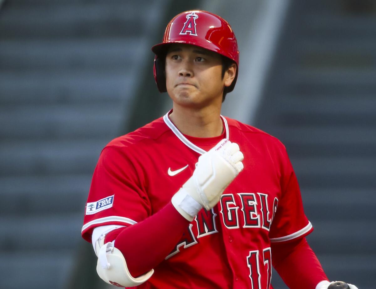 Angels designated hitter Shohei Ohtani walks on the field during a game against the New York Yankees in July.