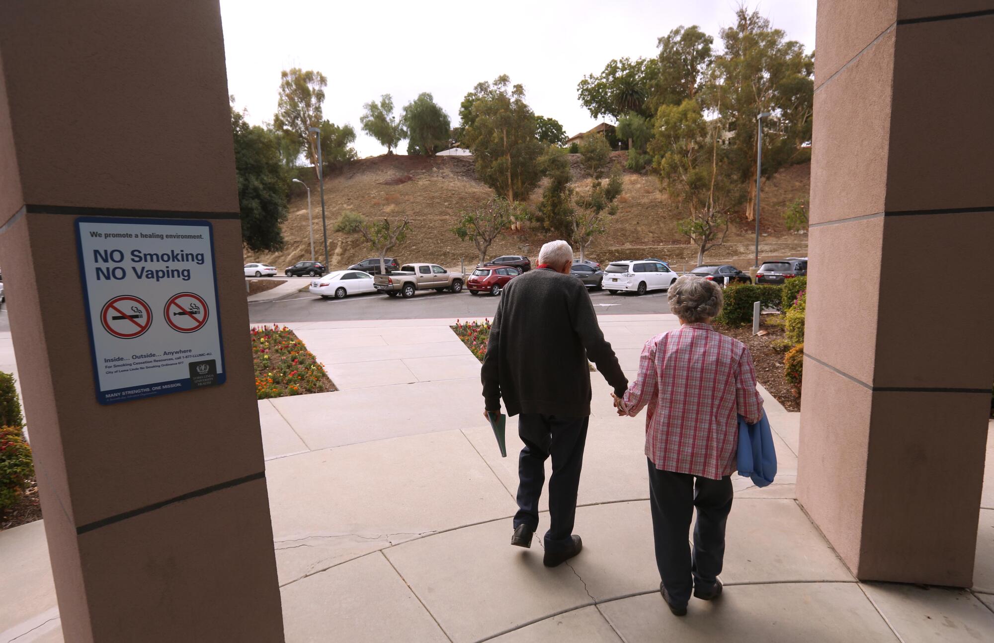 Jodee and Glenn Nichols leave the Loma Linda University Drayson Center.