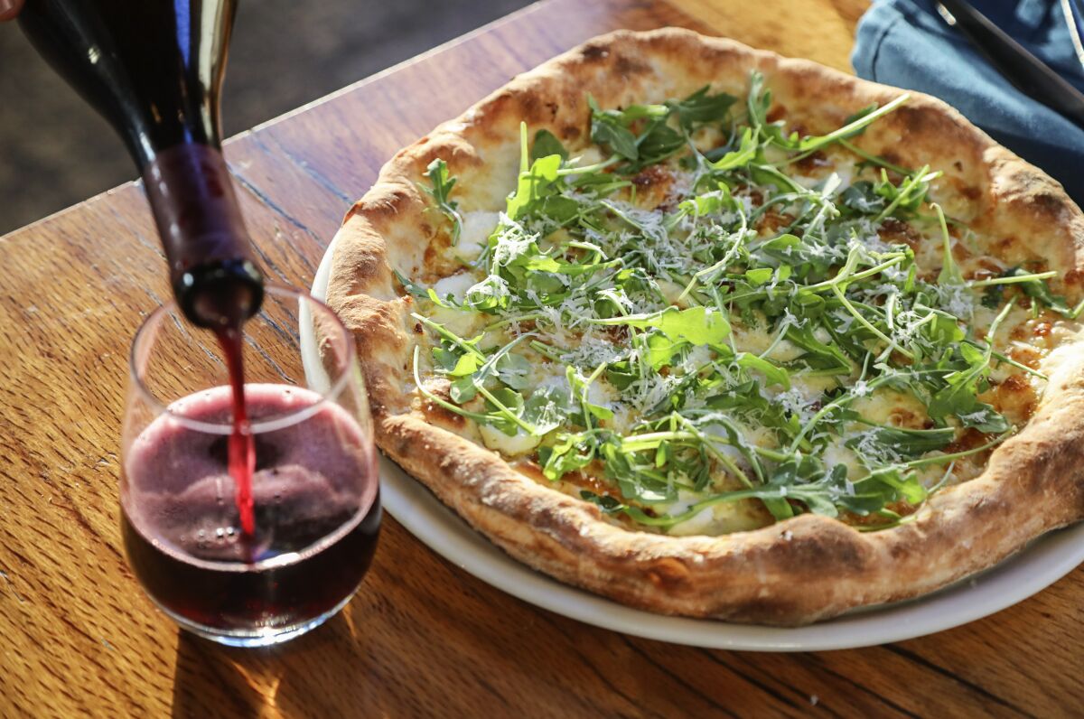 The Biancoverde pizza at Matt Lyons' Tribute Pizza in North Park is an homage to Pizzeria Bianco in Phoenix. Tribute's concept allows pizza lovers try iconic pies from around the world. 