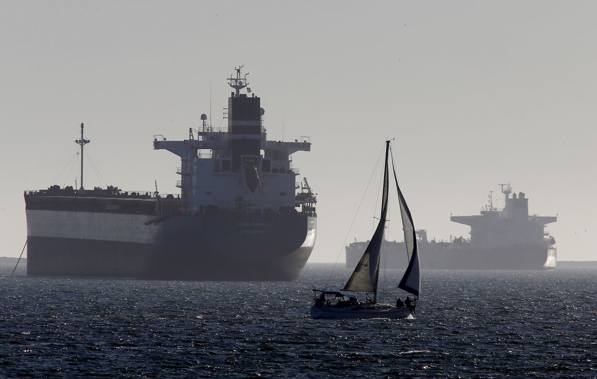 Oil tankers anchored off Long Beach on April 22. A nearly worldwide economic shutdown created a glut of crude oil and dropped prices below zero dollars per barrel.