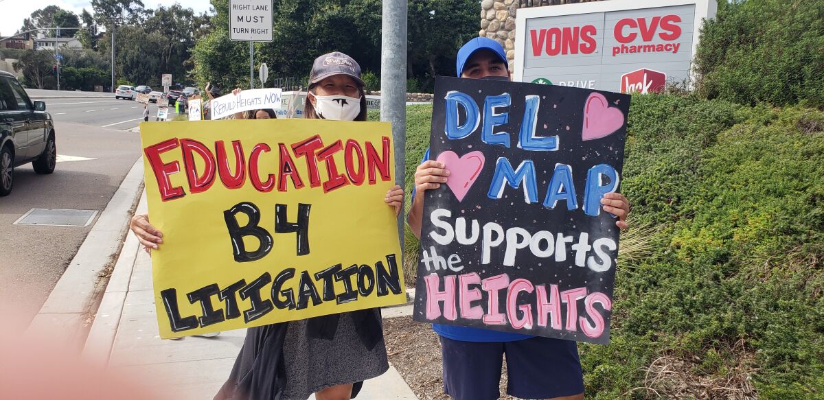 Demonstrators in the Heights rally.