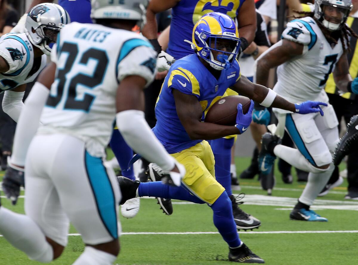 INGLEWOOD, CALIF. - OCT. 16, 2022. Rams wide receiver Brandon Powell gets extra yardage.