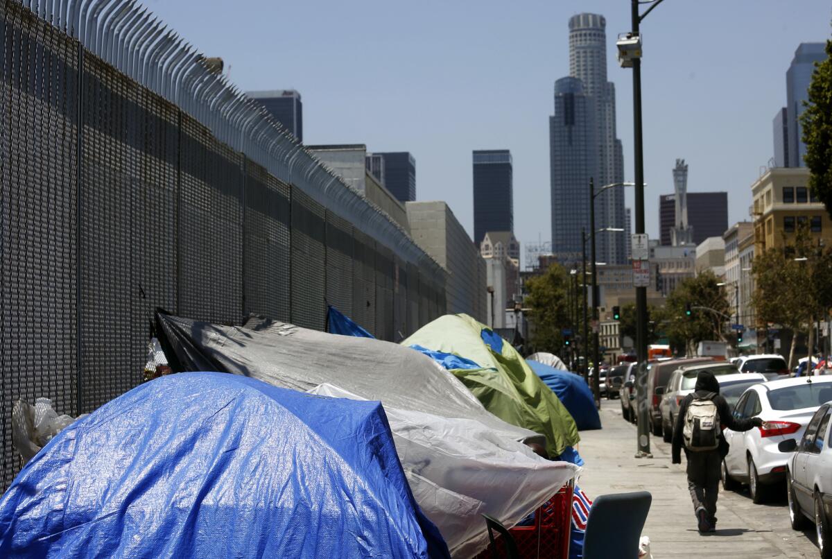 Tents line the sidewalks along 5th Street in L.A.'s skid row earlier this year.