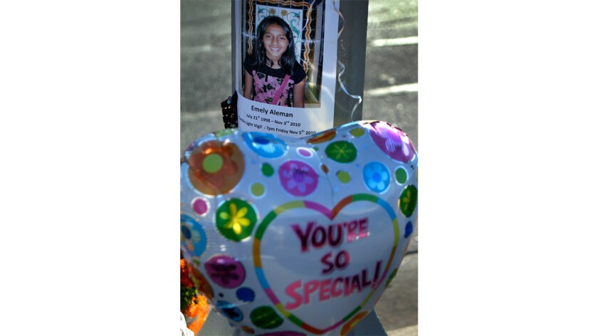 A photo of Emely Aleman adorned a makeshift memorial in 2010 after she was struck and killed while crossing a North Hollywood street. The L.A. City Council agreed to pay the girl's family $15 million to settle a lawsuit.