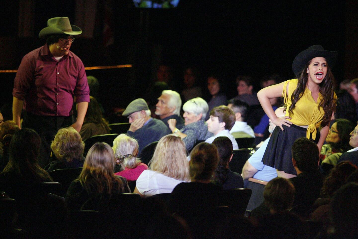Michael Dieguez, left, and Annmarie Rizzo perform during a John Burroughs High School Vocal Music Assn. performance, "Burroughs on Broadway," which took place at John Burroughs High School in Burbank on Friday, October 12, 2012.