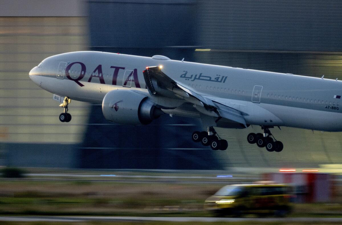 A Qatar airways plane lands at the airport in Frankfurt, Germany.