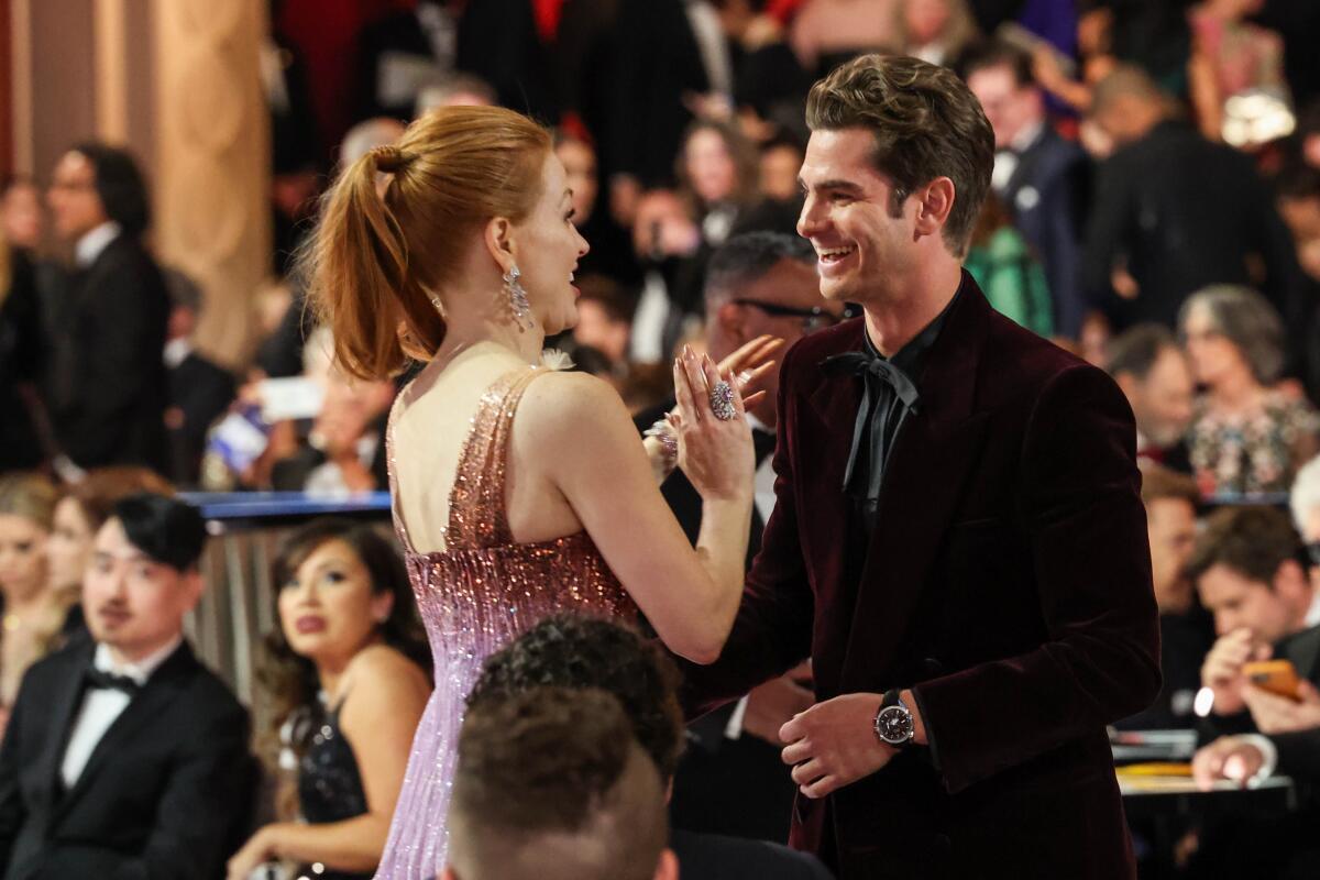 Andrew Garfield talked with Jessica Chastain during the show at the 94th Academy Awards.