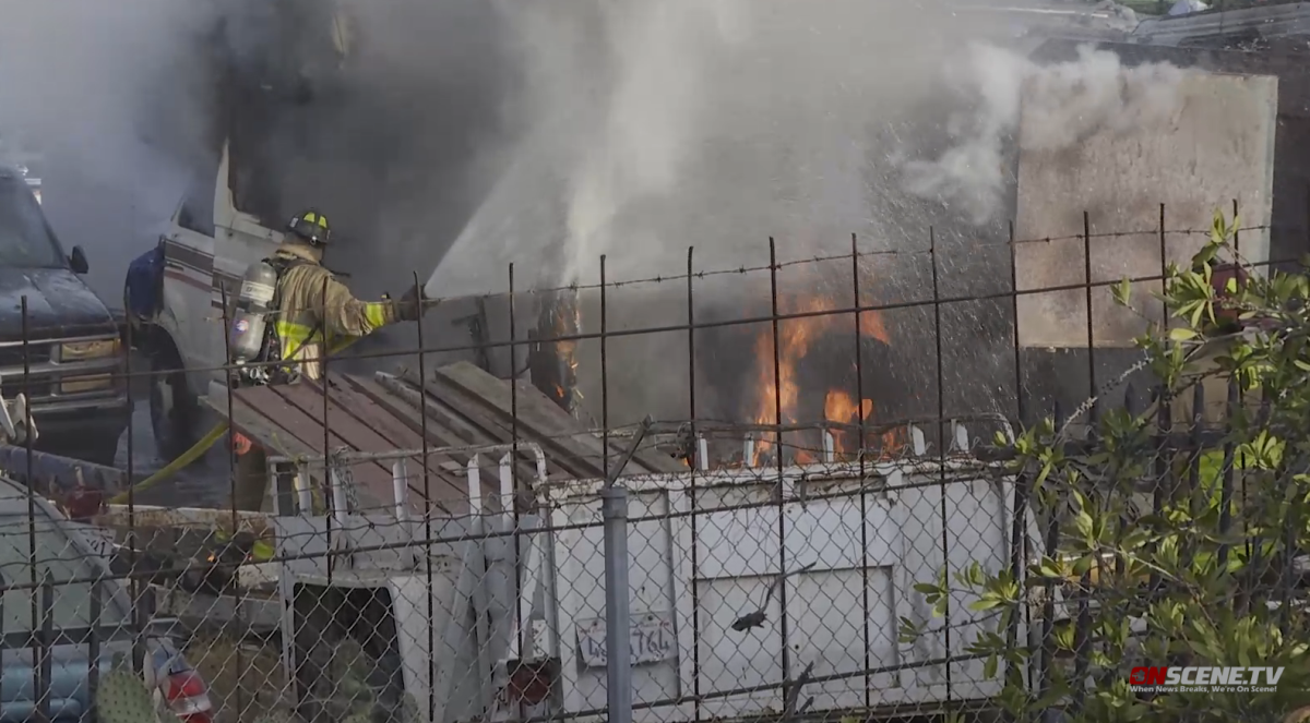 Fire investigators are looking into three fires set during a single 24-hour period at a tow lot in Logan Heights.