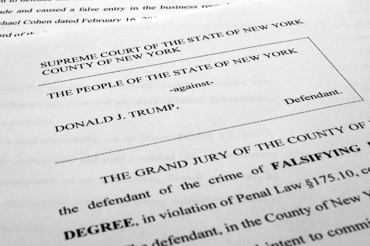 A copy of the first page of the indictment of former President Donald Trump in New York.