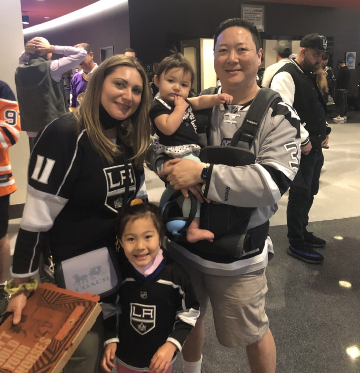 Kings fans Arthur Whang, his wife Lindsey and daughters Charlotte and Penelope.