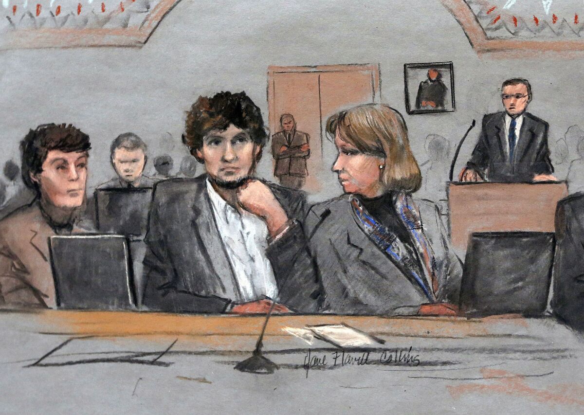 In this sketch, Dzhokhar Tsarnaev is depicted between his defense attorneys Miriam Conrad, left, and Judy Clarke during trial. To avoid the death penalty, Tsarnaev's lawyers are betting on winning the jury's mercy and portraying their young client as a pawn of his older brother.