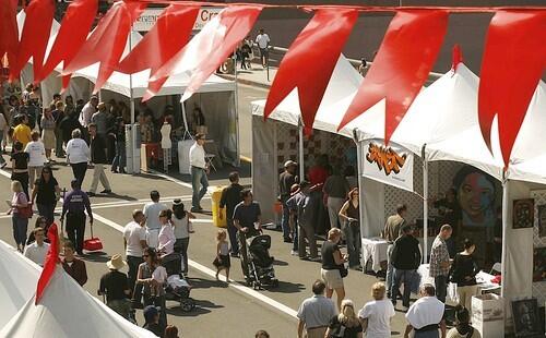 Crowds gather to enjoy the Grand Avenue Festival.