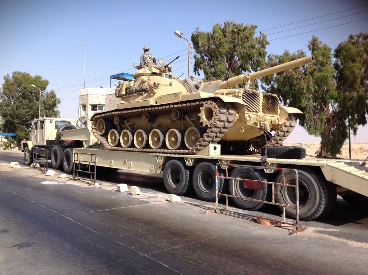 An Egyptian military tank is deployed in the northern Sinai town of Arish.