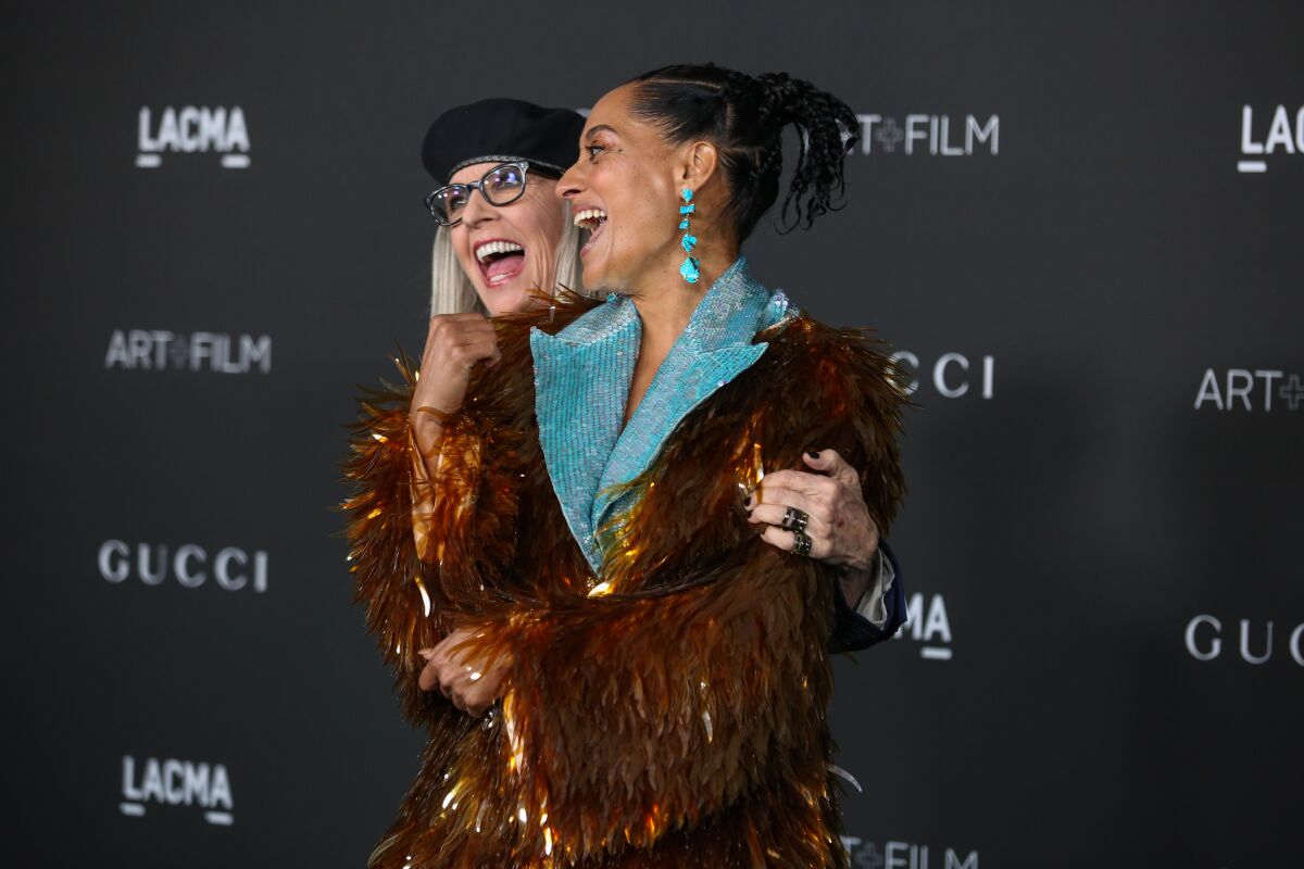 Diane Keaton, left, hugs  Tracee Ellis Ross at the LACMA Art+Film Gala.