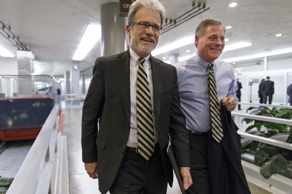 Sens. Tom Coburn, R-Okla. (left), and Richard Burr, R-N.C., two of the three sponsors of a GOP alternative to the Affordable Care Act. Not shown: Sen. Orrin Hatch, R-Utah.