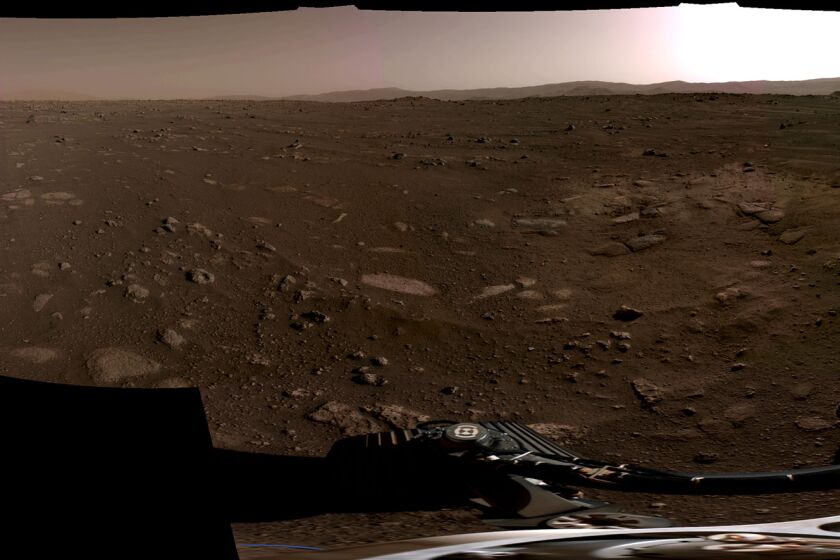 MARS - FEBRUARY 20: In this handout provided by NASA, this panorama, taken on Feb. 20, 2021, by the Navigation Cameras, or Navcams, aboard NASA’s Perseverance Mars rover, was stitched together from six individual images after they were sent back to Earth. The Perseverance Mars rover landed on Mars Thursday, February 18, 2021. A key objective for Perseverance's mission on Mars is astrobiology, including the search for signs of ancient microbial life. The rover will characterize the planet's geology and past climate, paving the way for human exploration of the Red Planet, and be the first mission to collect and cache Martian rock and regolith. (Photo by NASA via Getty Images)