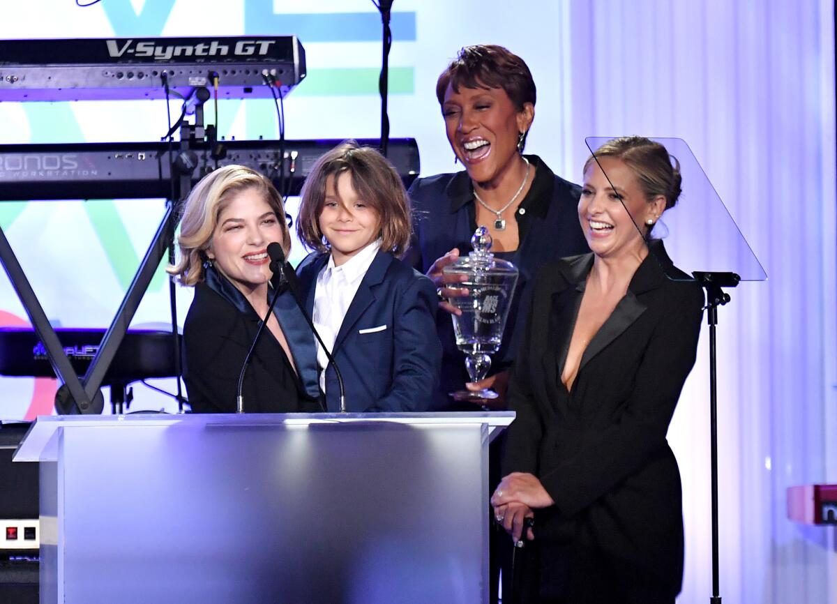 Honoree Selma Blair from left, Arthur Saint Bleick, Robin Roberts and Sarah Michelle Gellar onstage during the 26th Race to Erase MS gala.