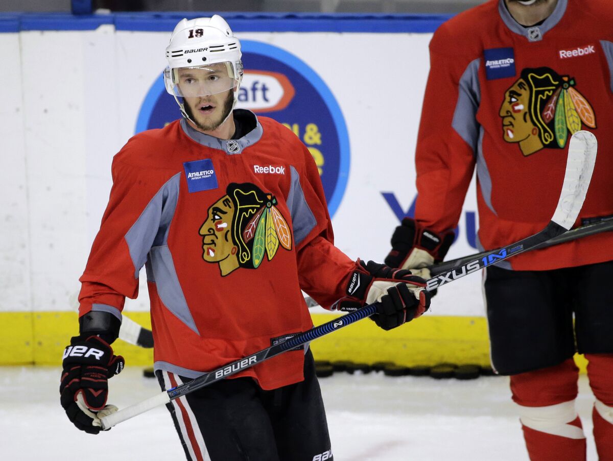 Blackhawks captain Jonathan Toews watches drills during a practice Tuesday ahead of Chicago's matchup with the Tampa Bay Lightning in the Stanley Cup Final.