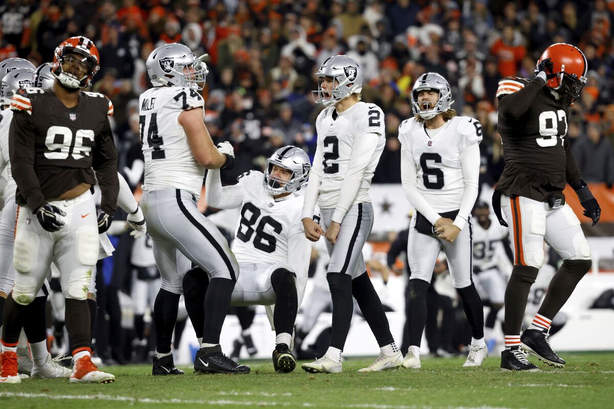 Raiders place kicker Daniel Carlson reacts after kicking a game-winning field goal against the Cleveland Browns.