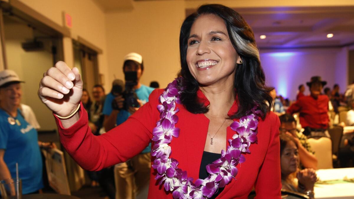 Rep. Tulsi Gabbard (D-Hawaii) greets supporters in Honolulu on Nov. 6. Gabbard has announced she's running for president in 2020.