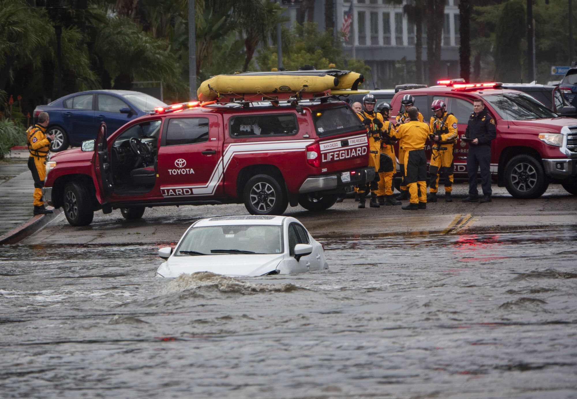 A car was submerged on Fashion Valley Road at the San Diego River which reached flood level i